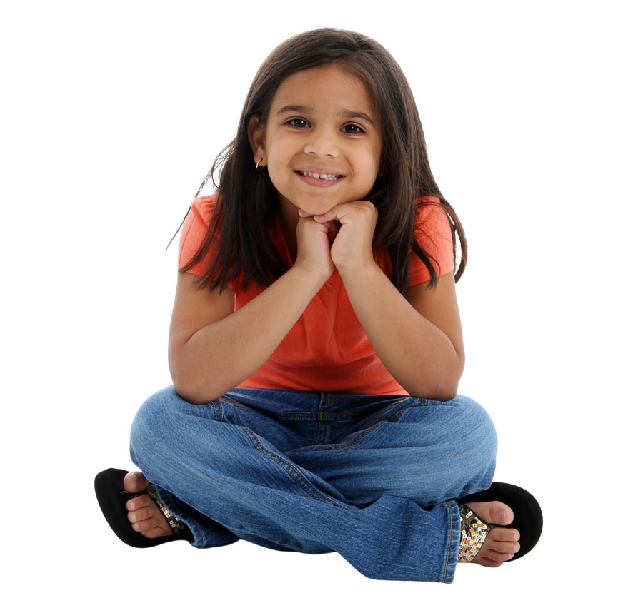 Young girl sitting and smiling